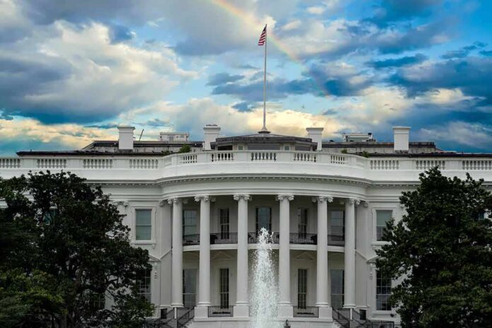 1526063618 featured image White House with a rainbow in the sky.