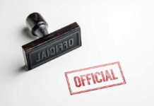 Official wooden stamp and red official stamp impression
