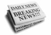 Stack of newspapers with breaking news headline