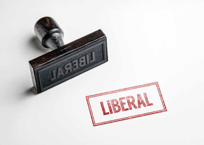 shutterstock_434602672.jpg featured image Rubber stamp with the word LIBERAL.