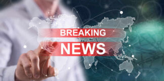 World map with Breaking News text overlay.