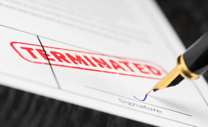 shutterstock_1169506726.jpg featured image Termination document being signed with fountain pen