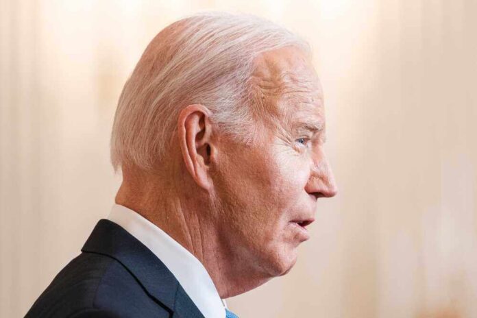 shutterstock_2425912013.jpg featured image Joe Biden in a suit speaking, facing right.