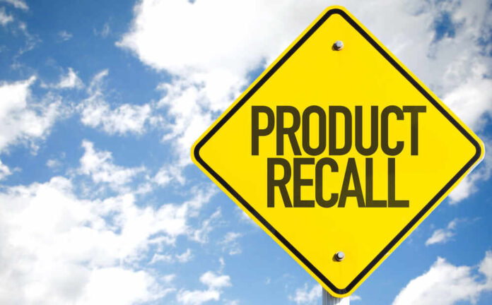shutterstock_419918254.jpg featured image Yellow product recall sign against cloudy sky