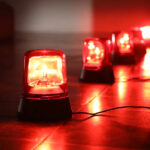 165 LOST LIVES SAVED by Rookie COAST GUARD SWIMMER Red emergency lights on a dark floor