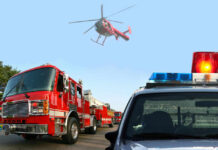 Fire truck police car and helicopter at scene