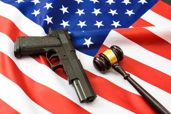 Gun and gavel on a U.S. flag