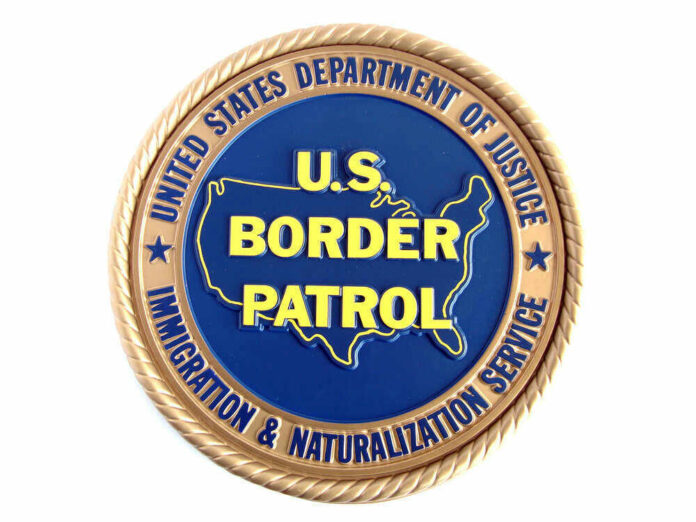 shutterstock_36533647.jpg U.S. Border Patrol emblem with Department of Justice insignia