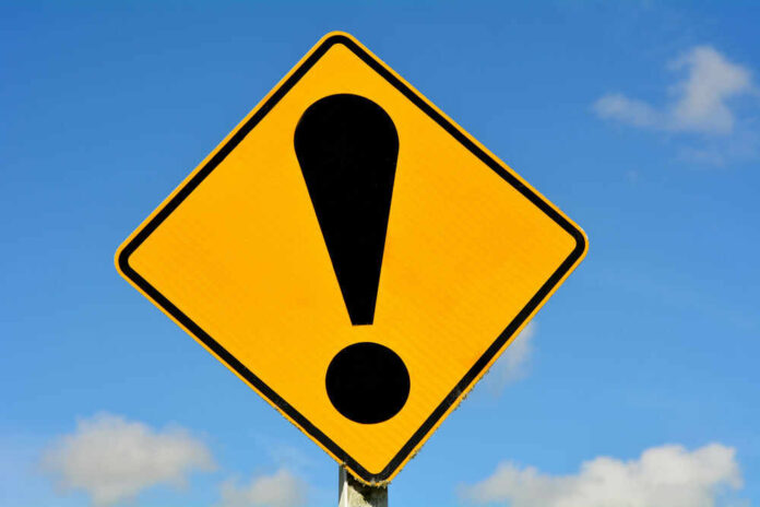 Yellow caution sign with exclamation mark symbol