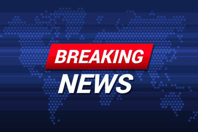 Breaking News text on world map background