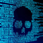 Skull silhouette in blue computer code background.