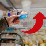 Cattle SHORTAGE Shocks Market — Prices UNRELENTING Hand holding credit cards with red upward arrow