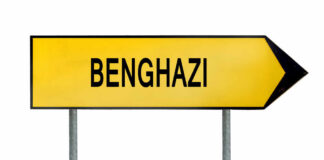 Directional sign pointing to Benghazi