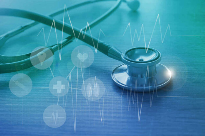 A stethoscope on a wooden surface with digital health icons and a heartbeat graph overlay