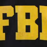 FBI Files Ignite New Epstein Hunt FBI logo displayed in large yellow letters on a black background