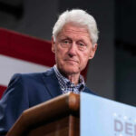 Bill Clinton Under Oath: Epstein Firestorm Bill Clinton speaking at podium.