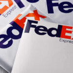 FedEx’s Massive Promise to Customers Multiple FedEx Express shipping envelopes stacked together