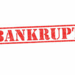 Red stamped word bankrupt on white background