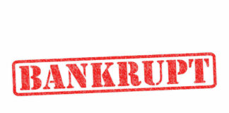Red stamped word bankrupt on white background
