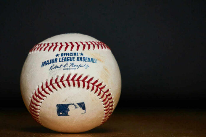 Major League Baseball ball with commissioner signature and logo.