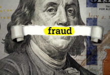 Dollar bill with fraud text overlay