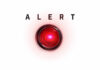 A red alert button with the word 'ALERT' above it