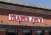 Exterior view of a Trader Joe's grocery store with a prominent sign
