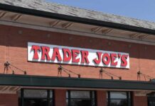 Exterior view of a Trader Joe's grocery store with a prominent sign