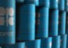 Stacked blue oil barrels with OPEC logo