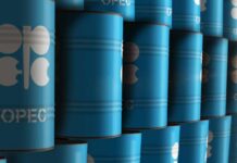 Stacked blue oil barrels with OPEC logo