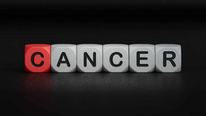 Blocks spelling the word 'CANCER' with one block in red