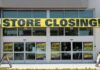 Storefront with a large 'STORE CLOSING' banner and sale signs