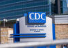 Rare Ebola Strain – Americans at Risk? CDC building sign in front of structure.