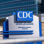 Rare Ebola Strain – Americans at Risk? CDC building sign in front of structure.