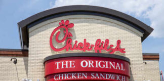 Exterior view of a Chick-fil-A restaurant featuring a prominent sign