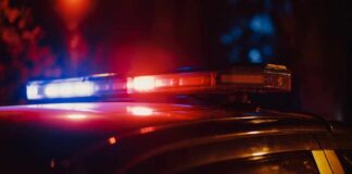 Close-up of a police car's emergency lights at night