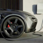 EV Shocker: Shares Tumble 8%! Electric car charging at a station.