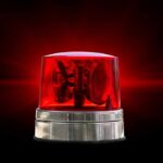 Red emergency light on a black background