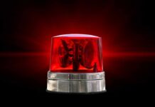 Red emergency light on a black background