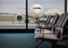 Power Bank Panic Diverts Passenger Aircraft Flight! View of an airplane from an airport waiting area