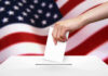 Voting Map UPROAR: Will It Impact You? Hand dropping ballot into box, American flag background.