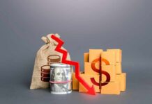 America’s Savings VANISH — What’s Draining Wallets? A visual representation of financial decline with money and boxes