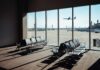 Pilot Alarmed — But Where’s The Damage? View of an airport waiting area with an airplane taking off in the background