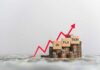 UPDATE: Energy Shock Hijacks Inflation Graph showing inflation trend with coins and wooden blocks
