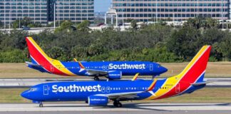 Two Southwest Airlines planes on an airport runway