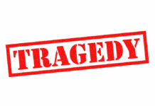 U.S. Festival Tragedy — Shots Rip Through Crowd Red tragedy stamp on white background