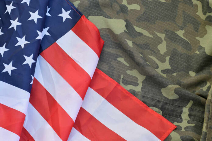 United,States,Of,America,Flag,And,Folded,Military,Uniform,Jacket.