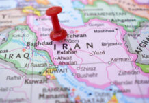 Red pushpin on map of Iran