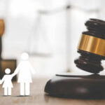 Supreme Court SMACKS Down Trump’s Birthright Gambit Gavel with family symbols and legal book background.