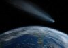 Galactic Sugar Stuns Origin Theories A comet streaking through space above Earth